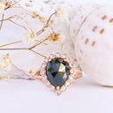 Rose Cut Pear Shaped Black Diamond Ring With White Diamond Halo in Rose Gold