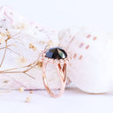 Rose Cut Pear Shaped Black Diamond Ring With White Diamond Halo in Rose Gold
