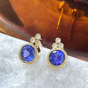 Round Bezel Set Tanzanite Studs with Bezel Set Trilogy Diamond Highlight