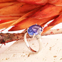 Show-stopping Oval Cut Tanzanite And Diamond Shoulder Highlight 18ct White Gold Ring