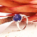 Show-stopping Oval Cut Tanzanite And Diamond Shoulder Highlight 18ct White Gold Ring