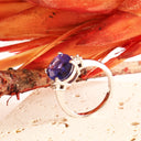 Show-stopping Oval Cut Tanzanite And Diamond Shoulder Highlight 18ct White Gold Ring