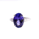 Show-stopping Oval Cut Tanzanite And Diamond Shoulder Highlight 18ct White Gold Ring