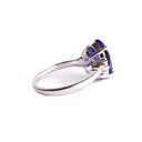Show-stopping Oval Cut Tanzanite And Diamond Shoulder Highlight 18ct White Gold Ring