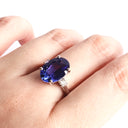 Show-stopping Oval Cut Tanzanite And Diamond Shoulder Highlight 18ct White Gold Ring