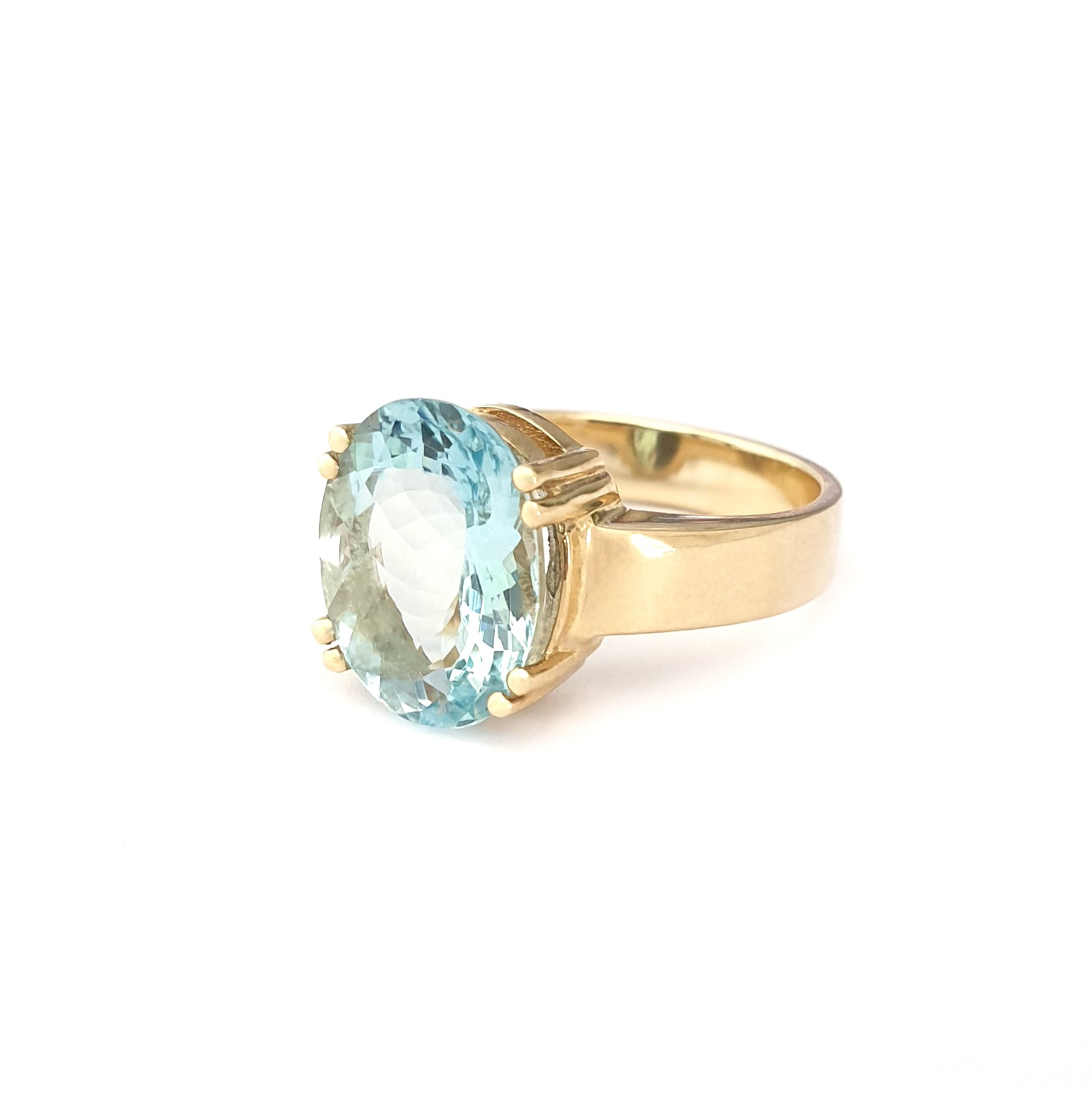 Solid Solitaire Aquamarine Oval Cut Double Claw Ring