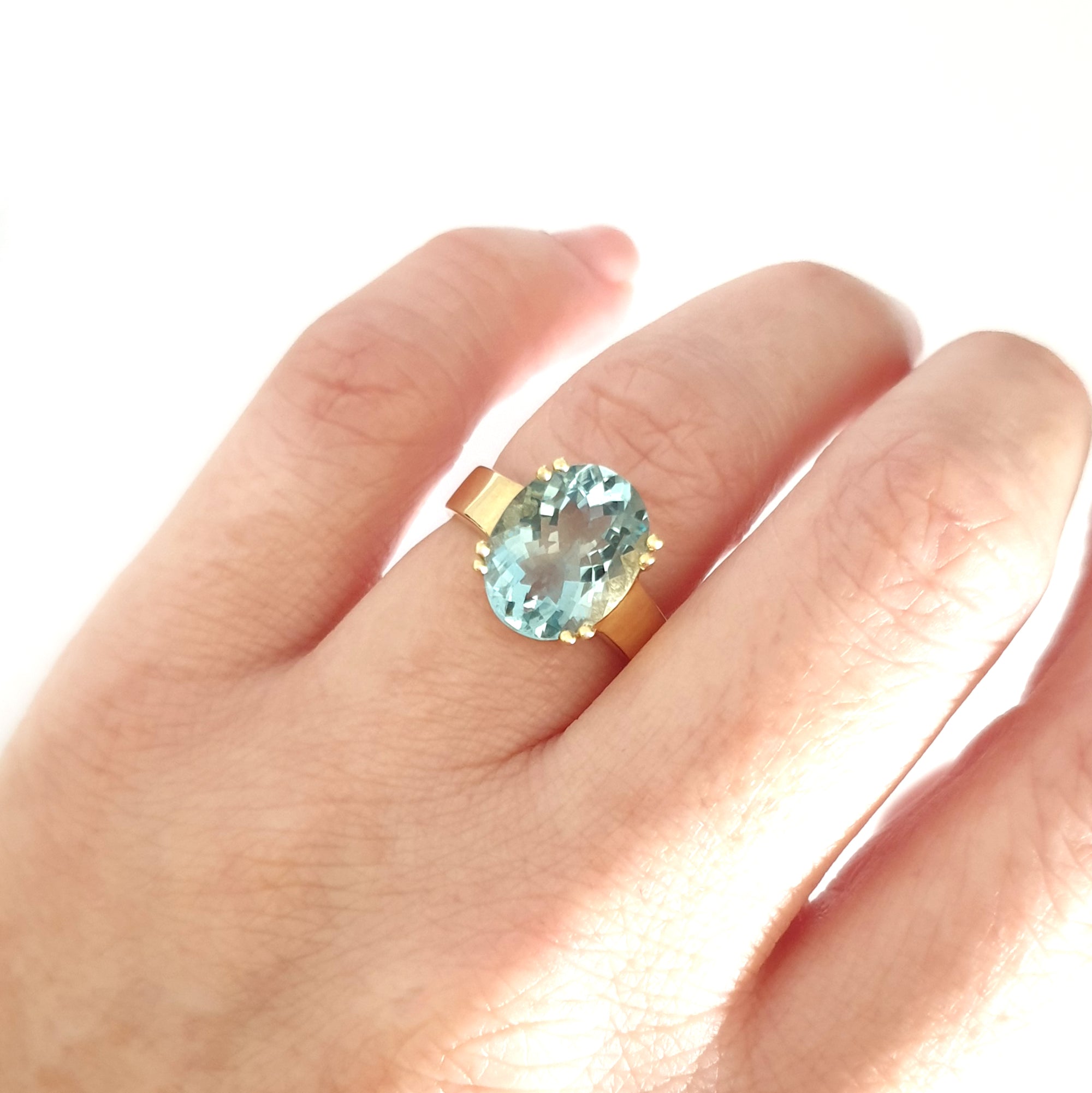 Solid Solitaire Aquamarine Oval Cut Double Claw Ring