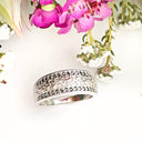 Silver paw track black diamond ring