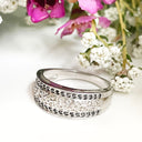 Silver paw track black diamond ring