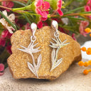 Silver Bird of paradise drop earrings