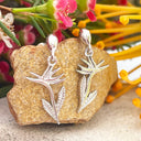 Silver Bird of paradise drop earrings