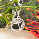 Silver Bird of Paradise Circular Pendant