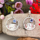 Silver Circular Table Mountain Earrings with Tanzanite Highlight