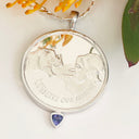 Silver Double Rhino Africa Coin With Trilliant Tanzanite Detail Pendant