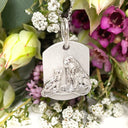 Silver Lioness and cub pendant