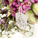 Silver Lioness and cub pendant