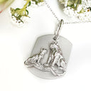 Silver Lioness and cub pendant