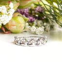 Silver paw and black diamond ring