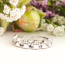 Silver paw and black diamond ring