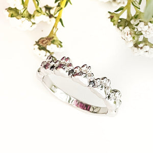 Silver paw and black diamond ring