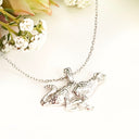 Silver leopard or cheetah pendant