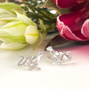 Silver cheetah studs