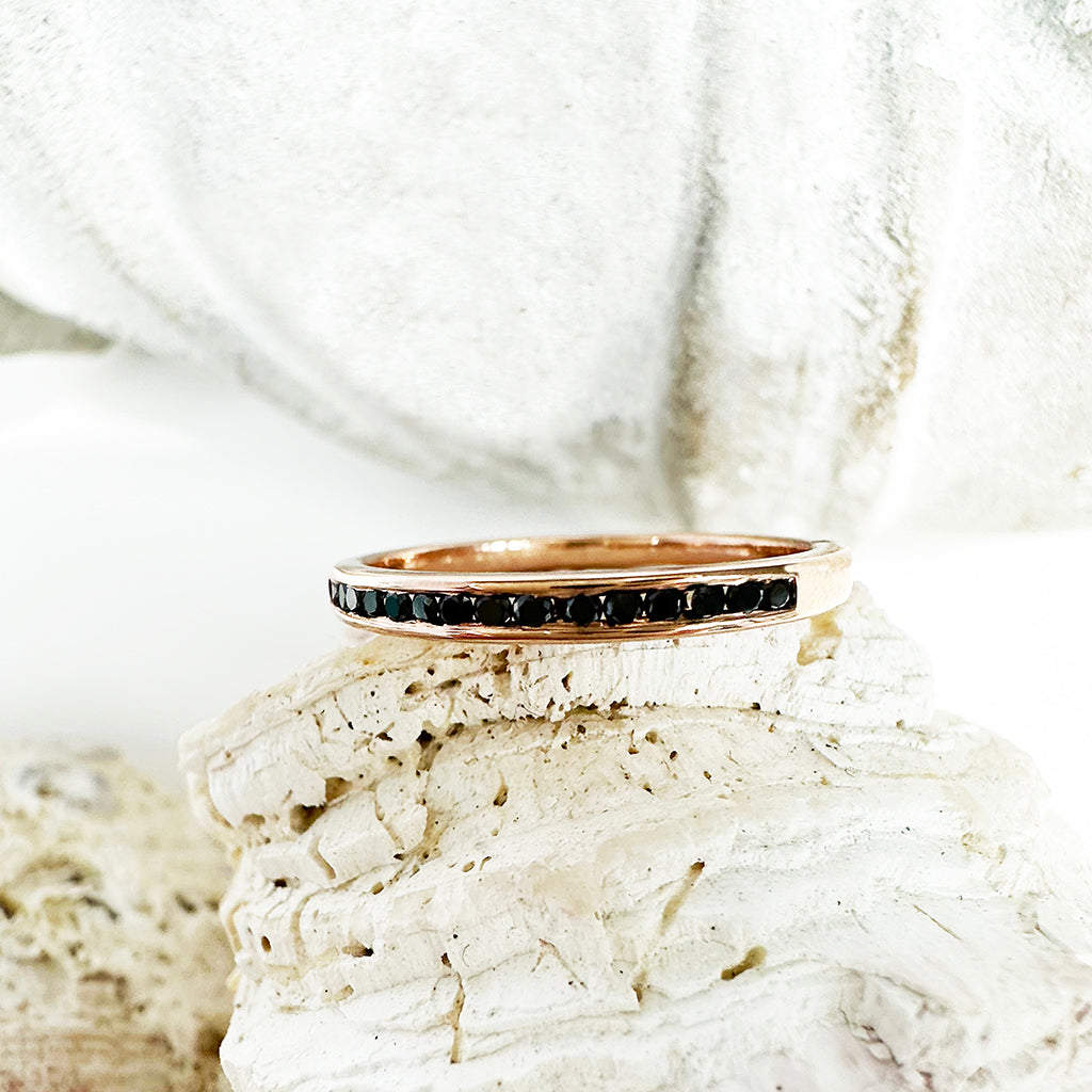 Sleek Channel Set Black Diamond Rose Gold Ring