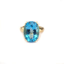 Solid Solitaire Deep Blue Topaz Oval Cut Double Claw Ring