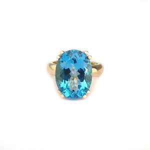 Solid Solitaire Deep Blue Topaz Oval Cut Double Claw Ring