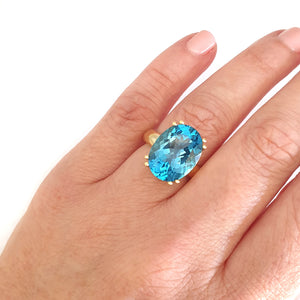 Solid Solitaire Deep Blue Topaz Oval Cut Double Claw Ring