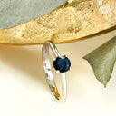 Solitaire blue sapphire white gold ring