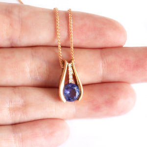 Split Rose Gold Round Tanzanite Pendant with Diamond Stripe Highlight