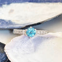 Blue Topaz and diamond ring