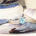 Blue Topaz and diamond ring