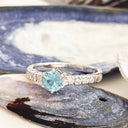 Blue Topaz and diamond ring