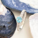 Blue Topaz and diamond ring
