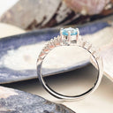 Blue Topaz and diamond ring