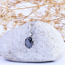 Stylish Six Claw Oval Cut Black Diamond With White Diamond Highlight White Gold Pendant