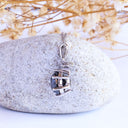 Stylish Six Claw Oval Cut Black Diamond With White Diamond Highlight White Gold Pendant