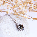 Stylish Six Claw Oval Cut Black Diamond With White Diamond Highlight White Gold Pendant