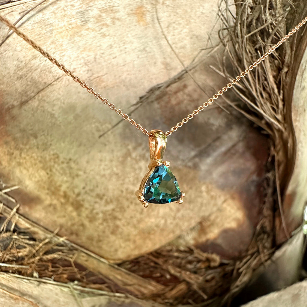 Stylish Solitaire Trilliant London Blue Topaz Rose Gold Pendant