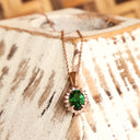 Sublime Oval Tsavorite Diamond Halo Rose Gold Pendant