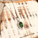 Sublime Oval Tsavorite Diamond Halo White Gold Pendant