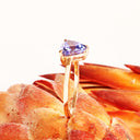 Sublime Solitaire Trilliant Cut Tanzanite Rose Gold Ring