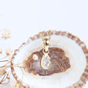 Sublime bezel Set Pear Cut White Diamond Yellow Gold Pendant