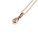 Sublime bezel Set Pear Cut White Diamond Yellow Gold Pendant