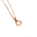 Subtle Crescendo Looped White Diamond Circular Rose Gold Pendant
