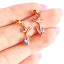Tanzanite Bird of Paradise Rose Gold Drop Earrings