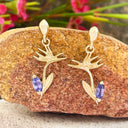 bird of paradise tanzanite yellow gold earrings