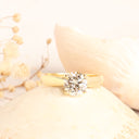 Tapered Shoulder Solitaire White Diamond Ring in Yellow Gold